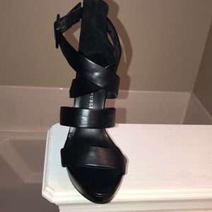 Black strap high heel shoe